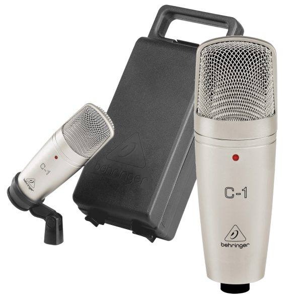 A silver Behringer C-1 condenser microphone positioned next to its swivel stand mount and an open, foam-lined black carrying case.