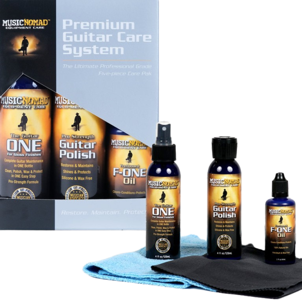 A retail box for the Music Nomad Premium Guitar Care System next to three physical bottles and two physical microfiber cloths.