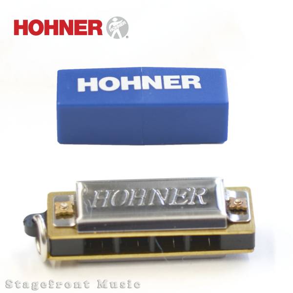 HOHNER PUCK 10 HOLE HARMONICA BRIGHT SOUNDING. LESS THAN 3 INCHES