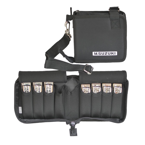 Seven silver harmonicas secured in individual elastic pockets inside a black zippered soft case, which features an adjustable black shoulder strap.