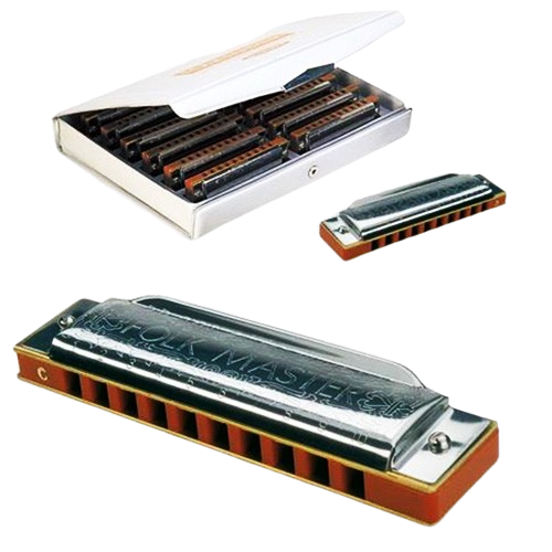 A 12-piece set of Suzuki Folkmaster harmonicas arranged in a white, slotted carrying case, with two individual Folkmaster harmonicas displayed outside the case showing their metal covers and plastic combs.
