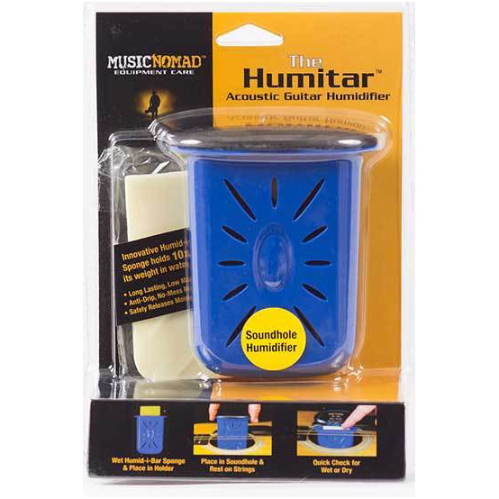 A blue acoustic guitar humidifier displayed inside a yellow and black retail box. The front of the box features three small inset photos illustrating how to wet the sponge, place the unit in the soundhole, and check the moisture level.