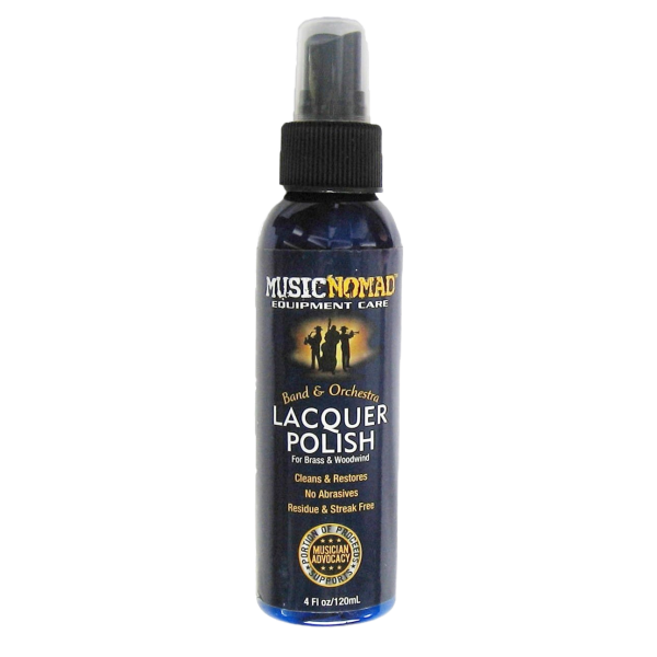 A blue 4 fluid ounce spray bottle with a clear overcap and black pump nozzle, labeled Music Nomad Band & Orchestra Lacquer Polish for Brass & Woodwind.