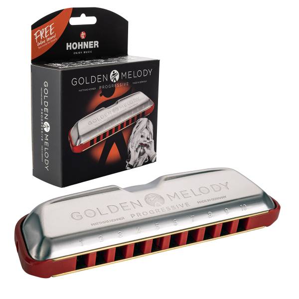 Silver and red Hohner Golden Melody Progressive diatonic harmonica displayed alongside its black retail box featuring a silhouette design and white text.