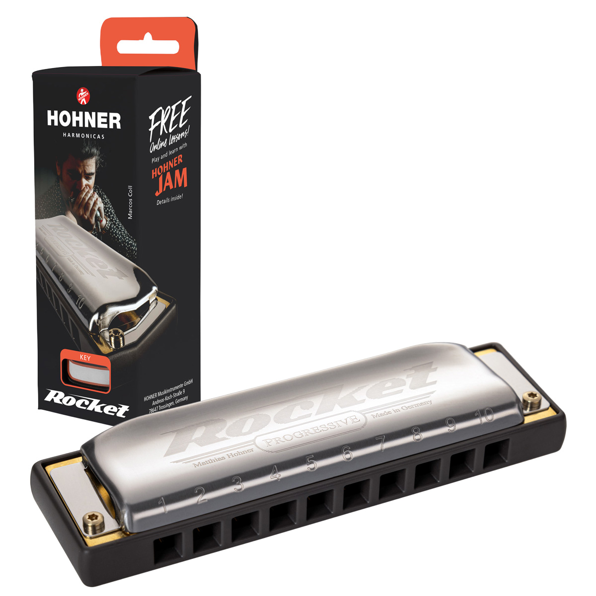 A silver Hohner Rocket diatonic harmonica with a black comb, positioned in front of its vertical black retail box featuring a portrait of Marcos Coll