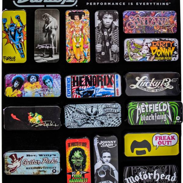 A black retail display board showcasing sixteen rectangular Jim Dunlop guitar pick tins. The metal tins feature colorful graphic artwork and logos for various artists and brands, including Jimi Hendrix, Santana, Dirty Donny, James Hetfield Black Fang, Johnny Cash, Kirk Hammett, and Motörhead.