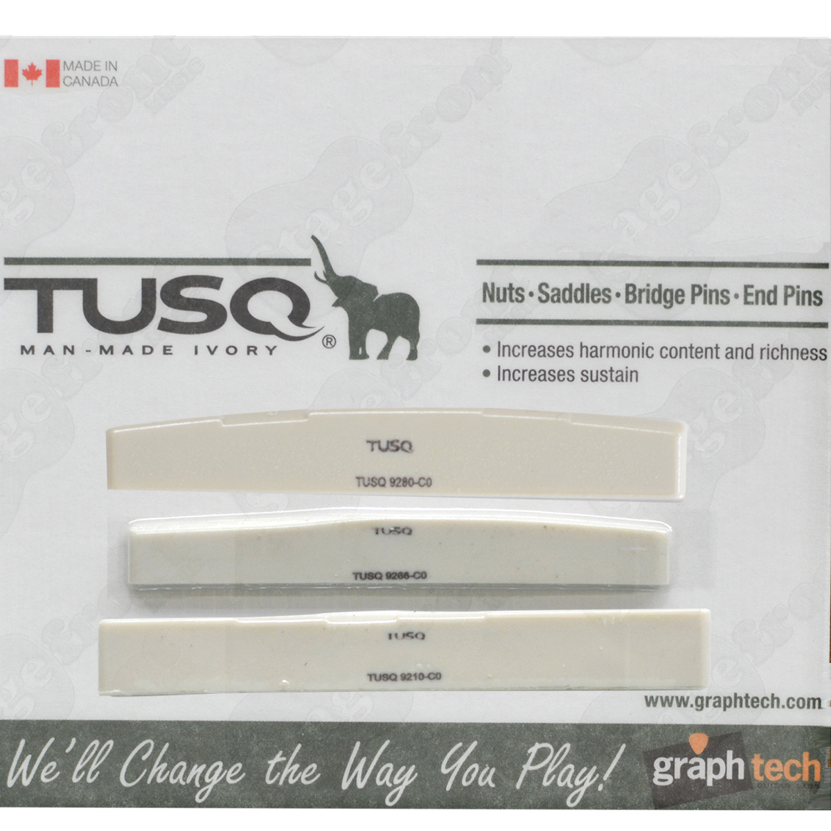 Graph Tech TUSQ man-made ivory guitar saddles in retail packaging, displaying three different saddle models mounted on a white and grey branded cardboard backing.