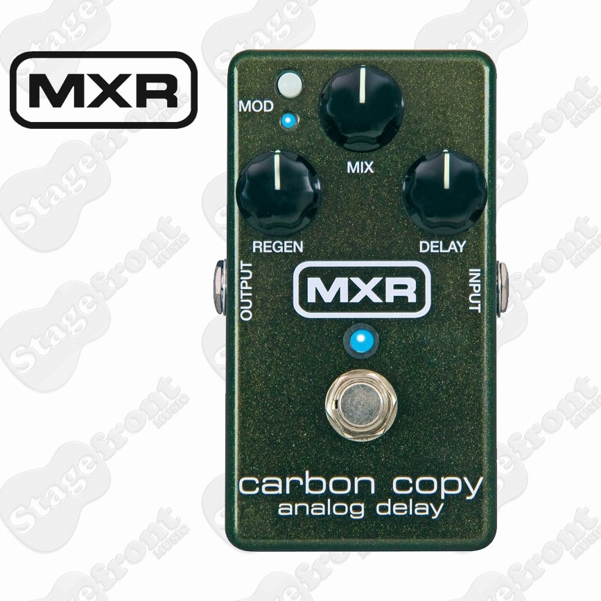 Green MXR Carbon Copy analog delay pedal with three adjustment knobs, a modulation button, and a footswitch.