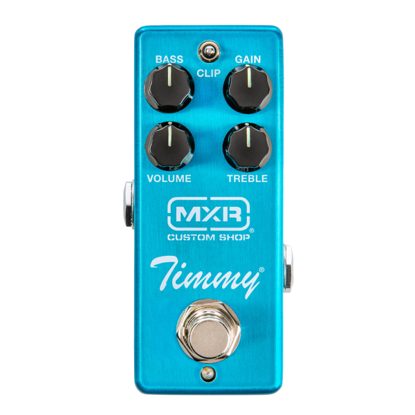 Top-down view of a light blue metallic MXR Custom Shop Timmy pedal with four black knobs for Bass, Gain, Volume, and Treble, a central clip switch, and a silver footswitch.