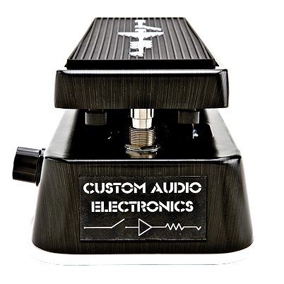 A black brushed metal MXR Custom Audio Electronics Crybaby wah pedal viewed from the front with a side control knob and a Custom Audio Electronics badge.