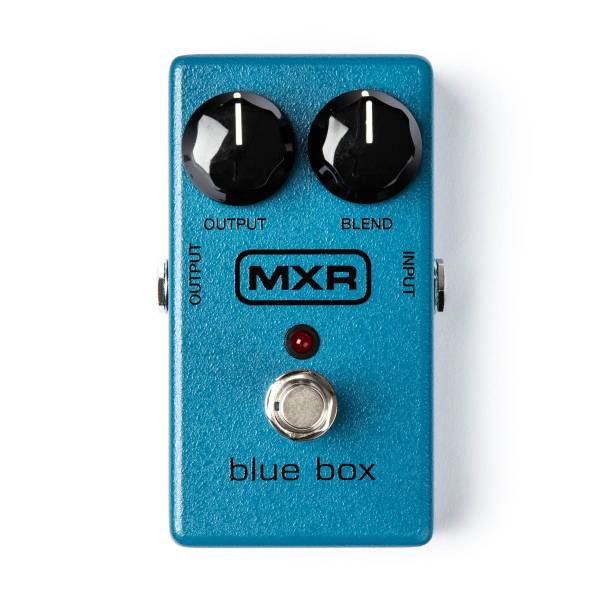 A rectangular blue guitar effects pedal with two black knobs labeled output and blend, a red LED, a silver footswitch, and a black MXR logo.