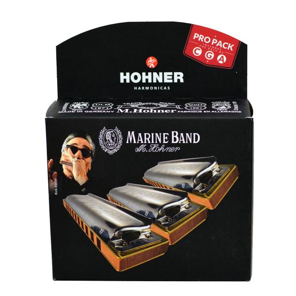 A black Hohner retail display box featuring a portrait of Rick Estrin, with diagonal graphics illustrating three Marine Band harmonicas and text indicating the inclusion of keys C, G, and A.