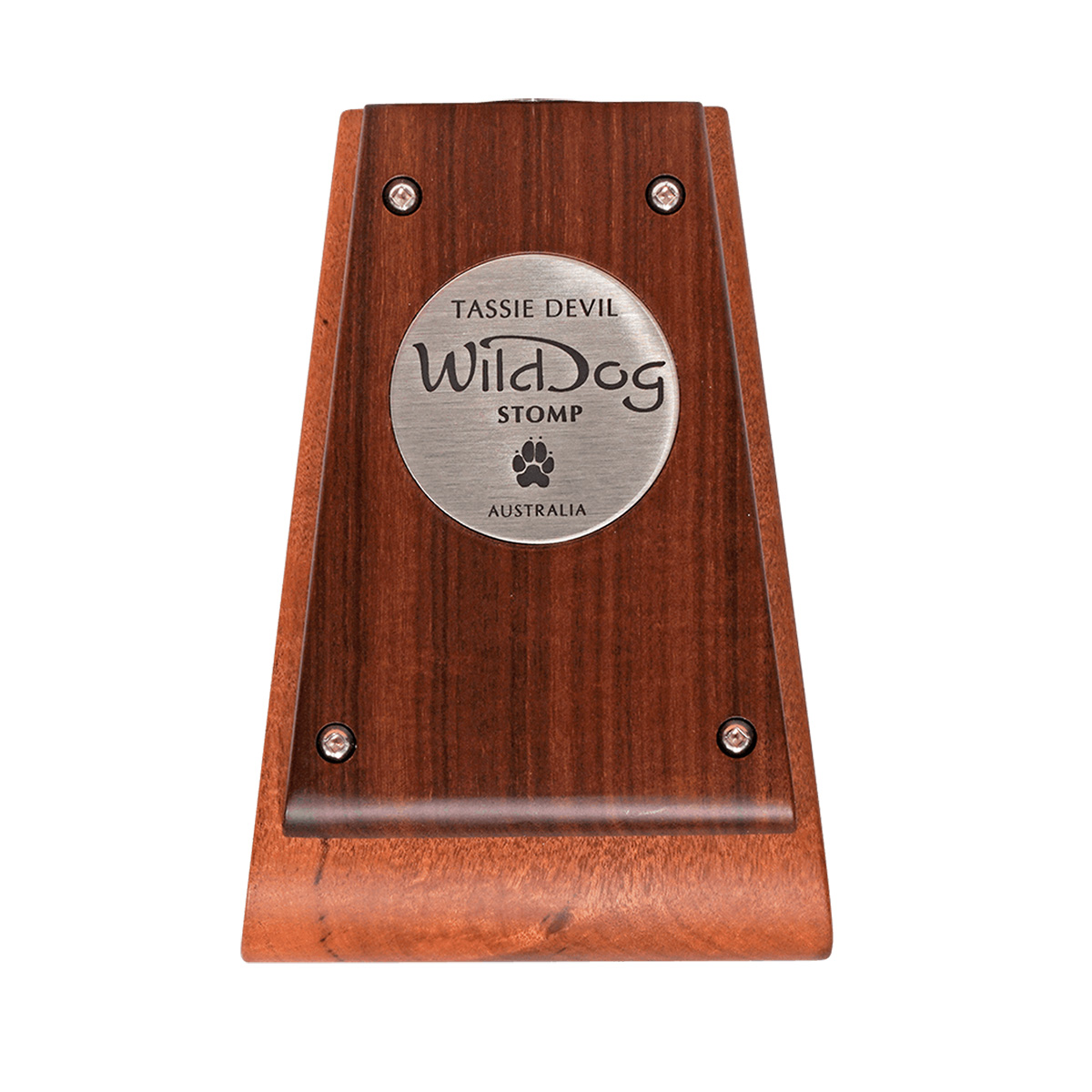Top-down view of the compact Wild Dog Tassie Devil wooden stomp box with a circular stainless steel nameplate.