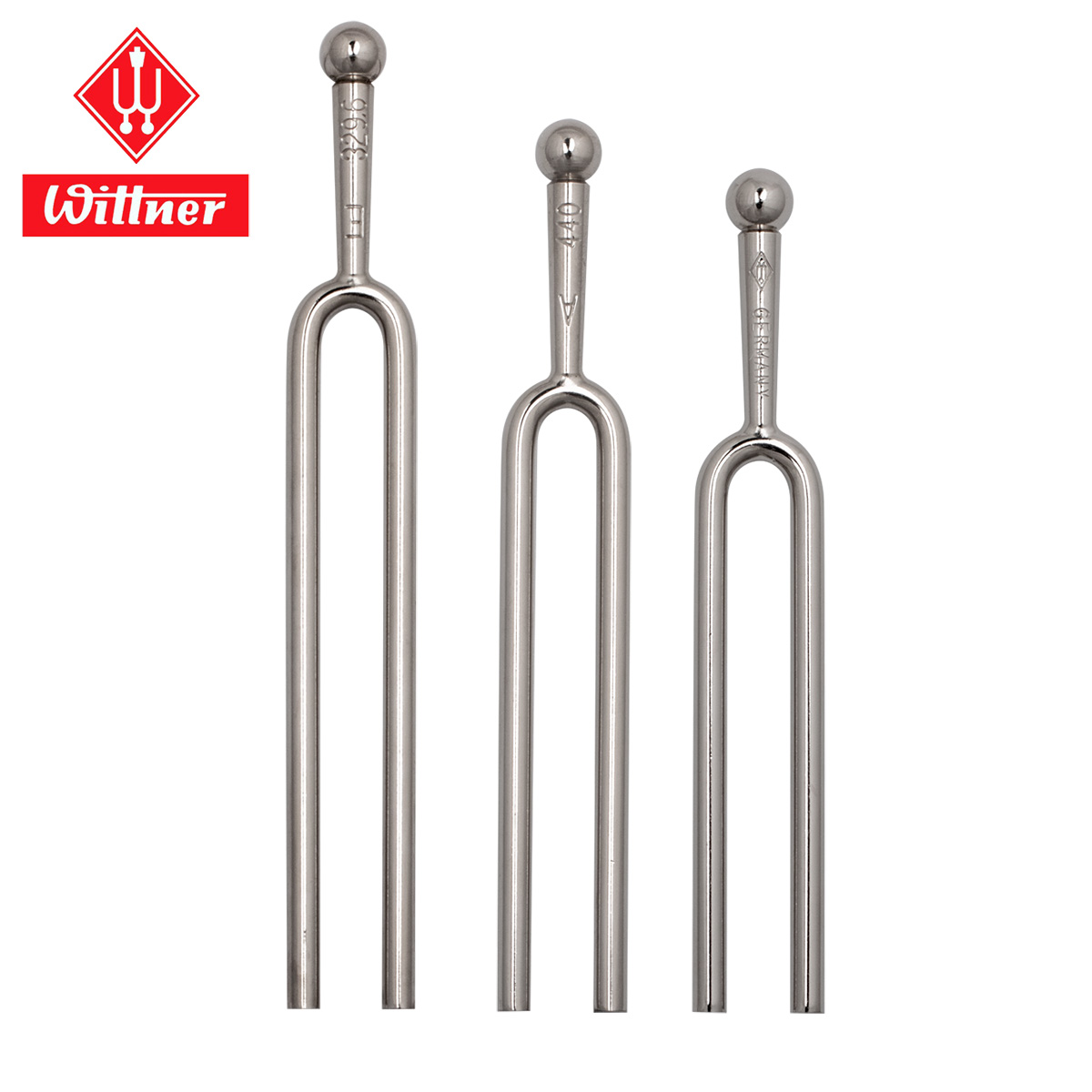 Three nickel-plated Wittner tuning forks with spherical ball ends and varying lengths, stamped with pitch frequencies and the word GERMANY, against a white background.
