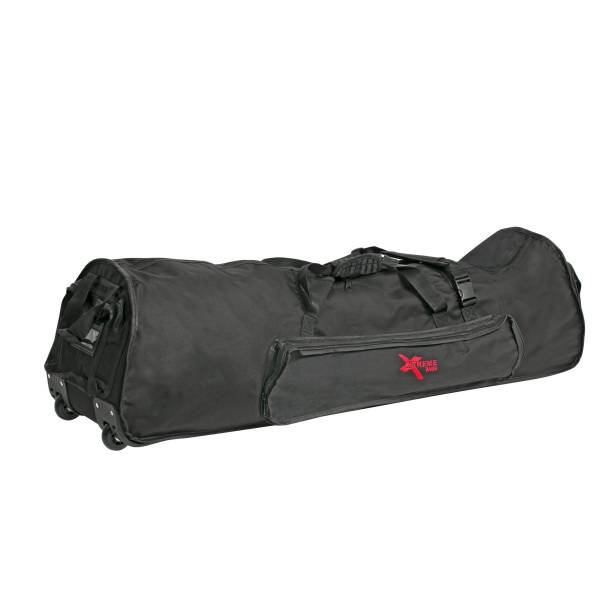 Extra-long black hardware bag equipped with end wheels, top carrying handles, a zippered side pocket, and a red Xtreme Bags logo.