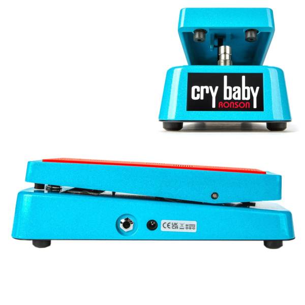 A side profile of the bright blue Dunlop Mick Ronson MR95LTD Cry Baby Wah pedal featuring a red footpad, instrument input jack, and 9V power input, accompanied by a top inset close-up shot that highlights the heel of the pedal and the black, white, and red "cry baby RONSON" logo plate.