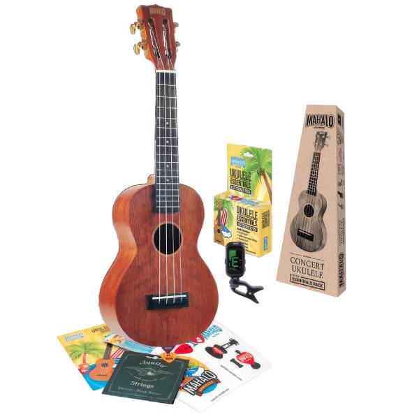 A Mahalo MJ2TBRK concert ukulele featuring a slotted headstock and natural matte finish, displayed next to its original packaging and an accessory kit containing a clip-on tuner, picks, and string packets.